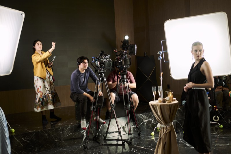 Camera rig and dolly track laid out on a production set.